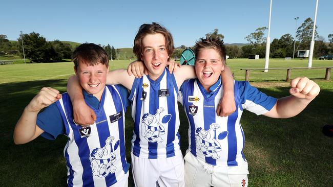 Jim Davidson, Caleb Ingram and Cam Edwards who all play for Buchan are pumped with the grant from the AFL. Picture: Michael Klein