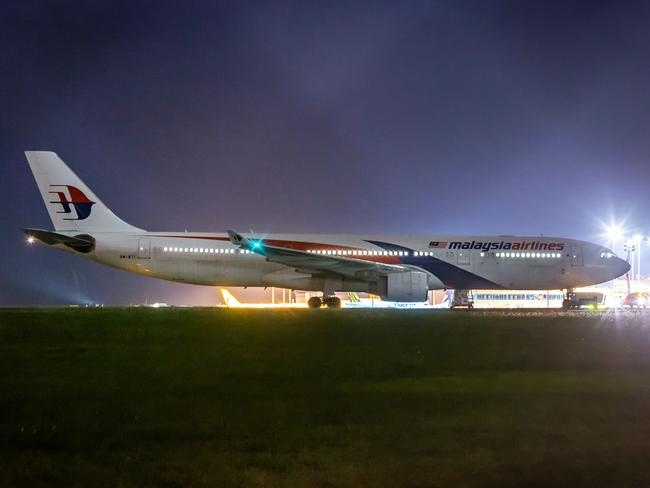 The plane sits on the tarmac. Picture: Gary Sissons