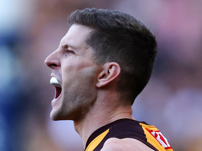 MELBOURNE, AUGUST 11, 2024: 2024 AFL Football - Round 22 - Carlton Blues V Hawthorn Hawks at the MCG. Luke Breust of the Hawks celebrates a goal. Picture: Mark Stewart