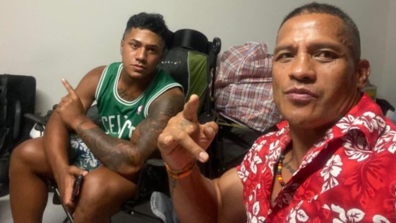 Broncos Tesi Niu with his father