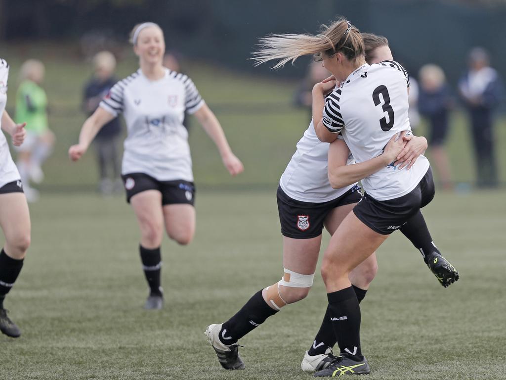 Hobart Zebras versus Kingborough Lions in the women's Statewide Cup final at KGV. Rachel Gill, left, hugs teammate Danielle Kannegiesser, right, after she scored the opening goal of the match. Picture: PATRICK GEE