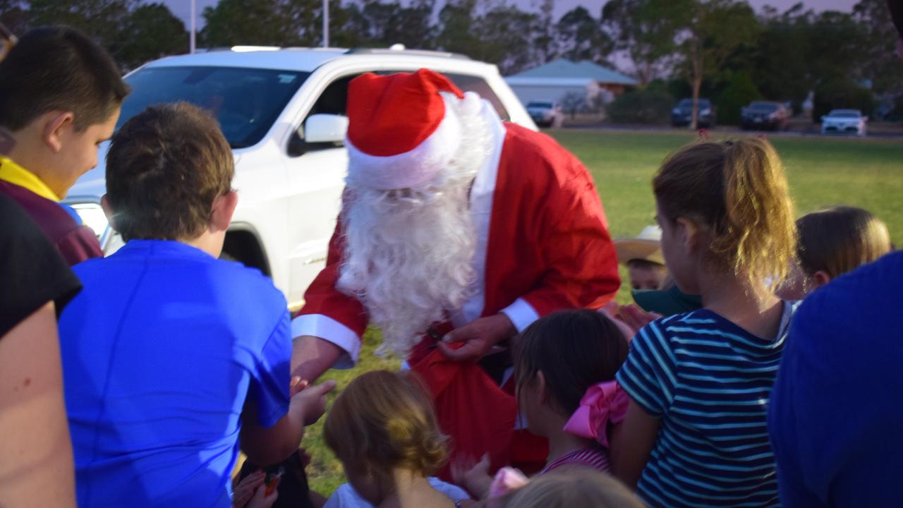 Santa was as popular as ever when he arrived with lollies for the kids.