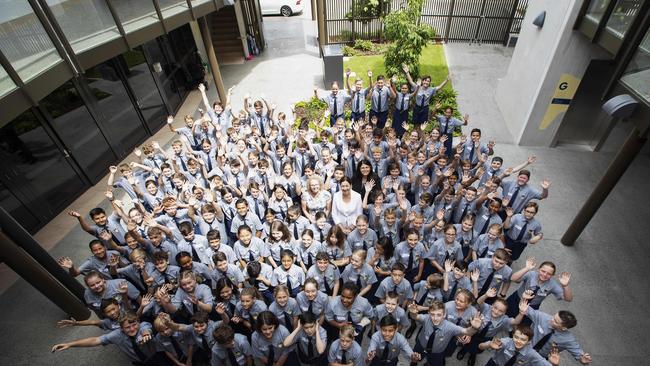 Principal Sharon Barker, Premier Annastacia Palaszczuk and Education Minister Grace Grace with students on the first day at Fortitude Valley State Secondary College.