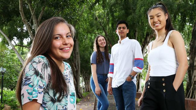 ATAR entry students Olivia Crane, 18, Kelvin Grove State College, Elouise Gaffney, 18, BSHS, Milind Bordia, 18, BSHS, and Angela Chen, 17, BSHS, await their results, Brisbane. Photographer: Liam Kidston.