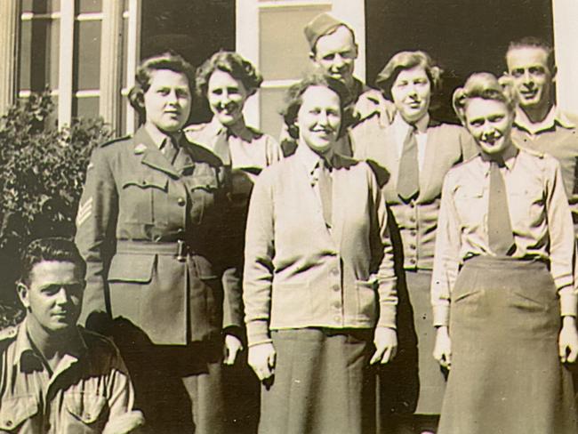 The Garage Girls and their drivers in 1944.