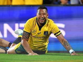 Israel Folau of the Wallabies celebrates after scoring a try. Picture: DARREN ENGLAND