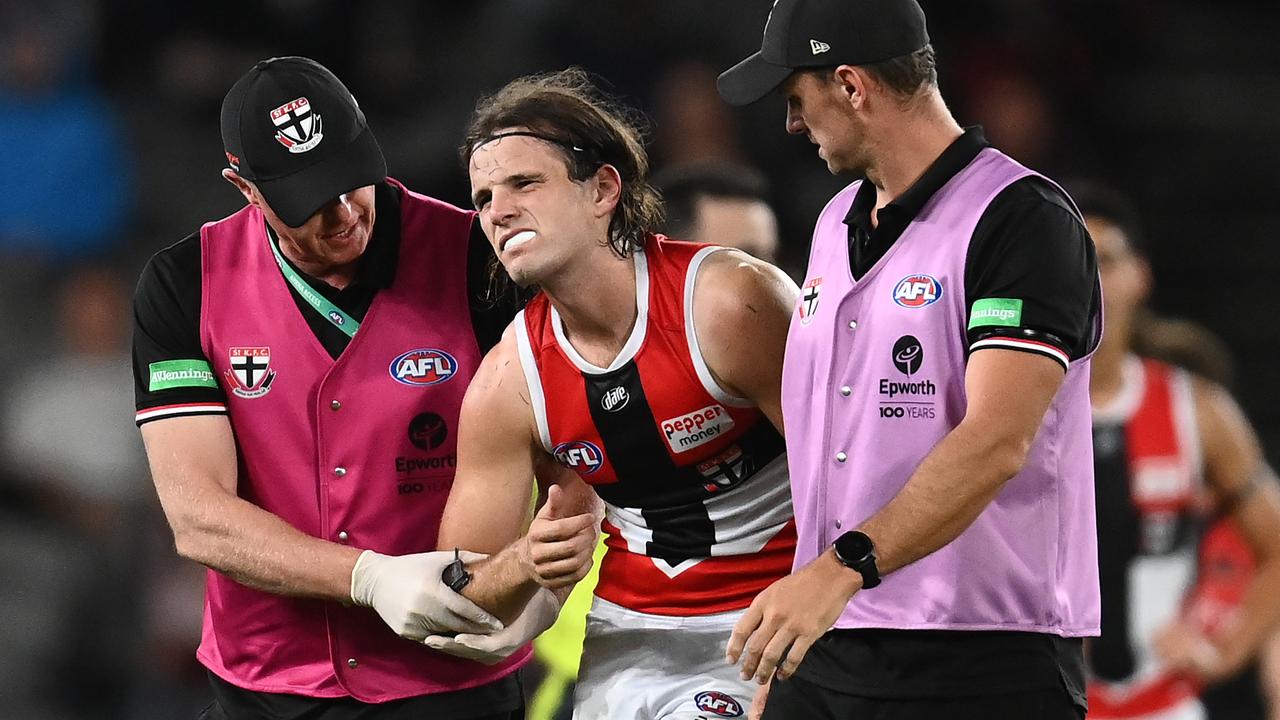 Hunter Clark in pain after hurting his shoulder. Picture: Quinn Rooney/Getty Images