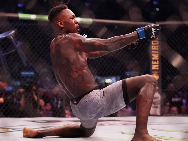 Israel Adesanya of New Zealand celebrates his win against Robert Whittaker of Australia during UFC 243 at Marvel Stadium in Melbourne, Sunday, October 6, 2019. (AAP Image/Michael Dodge) NO ARCHIVING, EDITORIAL USE ONLY