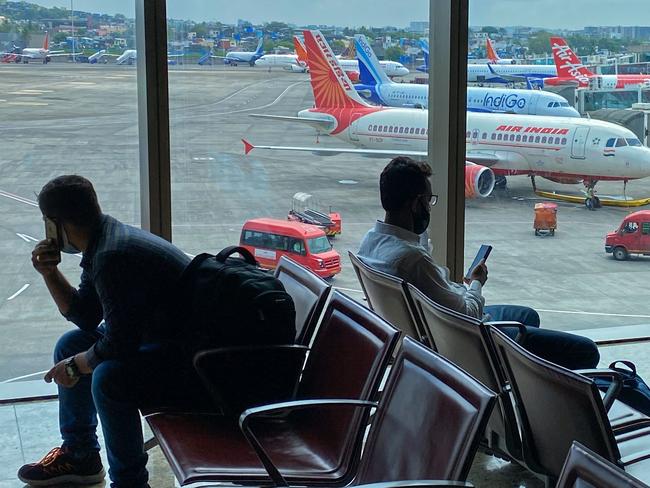 An Air India aircraft is pictured at a terminal of the airport in Mumbai as India has reopened to vaccinated foreign nationals. Picture: AFP