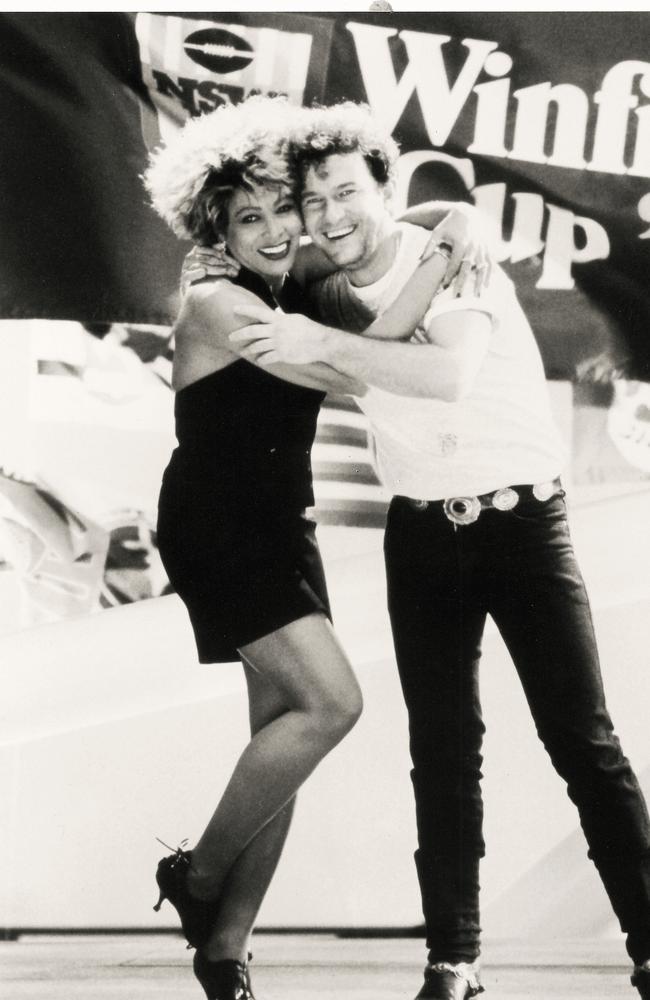 Tina Turner and Jimmy Barnes at the 1993 Grand Final. Picture: Action Photographics