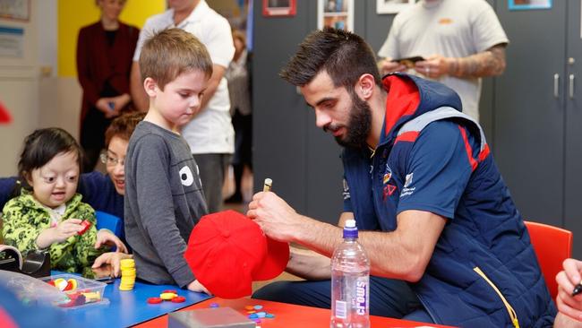 Adelaide Crows Wayne Milera signs autographs for kids at Women’s and Children’s Hospital, North Adelaide. Picture: Supplied/Adelaide Crows