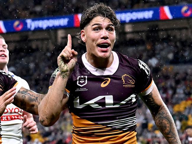 BRISBANE, AUSTRALIA - APRIL 20: Reece Walsh of the Broncos celebrates after scoring a try during the round seven NRL match between the Brisbane Broncos and Canberra Raiders at Suncorp Stadium, on April 20, 2024, in Brisbane, Australia. (Photo by Bradley Kanaris/Getty Images)