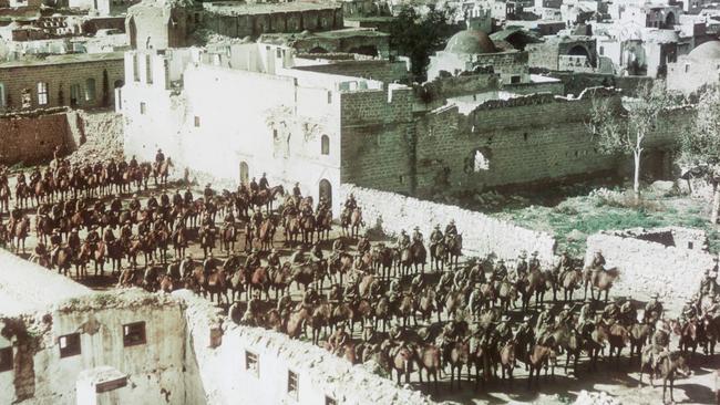 Squadrons of the 4th Australian Light Horse in formation on horseback at Gaza. Picture: Australian War Memorial/P03631.008