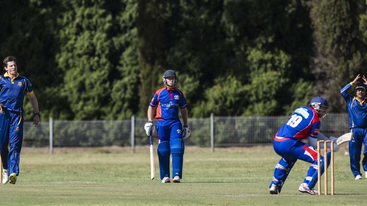 University bowler Matt Johnston reacts after bowling to Ben Anderson of Highfields. Picture: Kevin Farmer