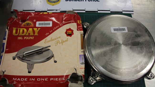 Australian Border Force officer intercepted cooking utensil packages from India containing pseudoephedrine. Picture: ABF