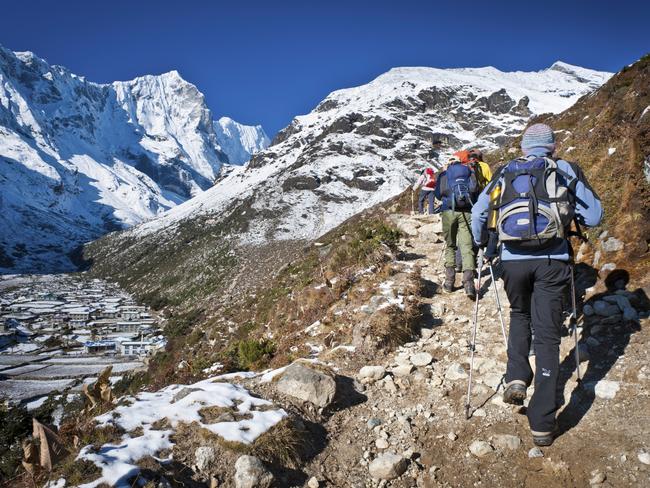 ESCAPE: INTREPID NEPAL .. Matt Johnston story .. trekkers make their way to one of the high Himalayan towns. Picture: iStock