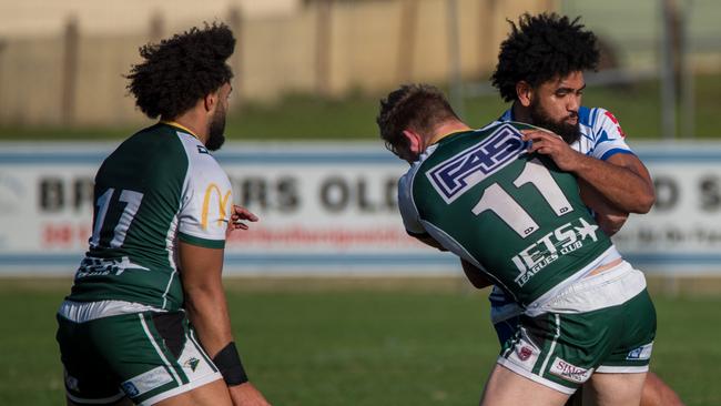 The Jets defence get to work in their recent Rugby League Ipswich match against Brothers this season. Picture: Bruce Clayton