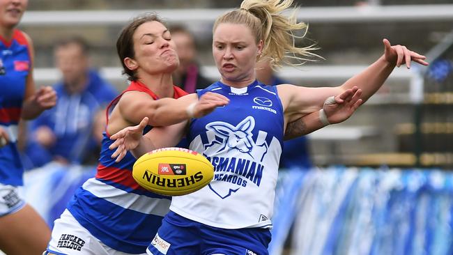 Daria Bannister of the Kangaroos is tackled. Picture: Steve Bell/Getty Images