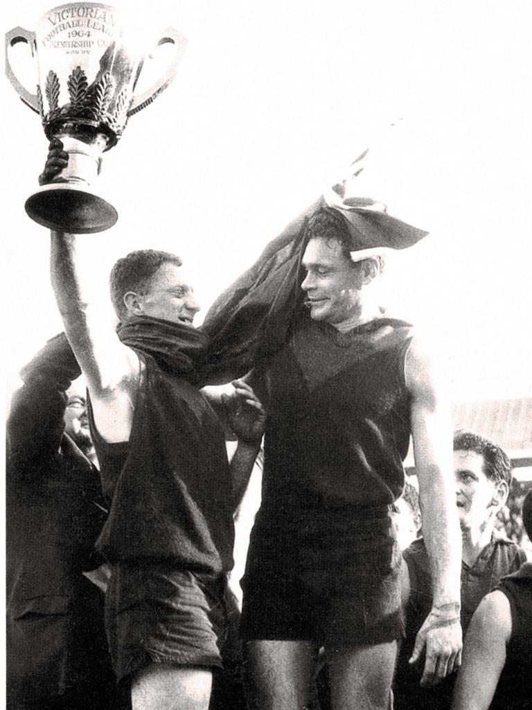 Bluey Adams and Ron Barassi celebrating their victory. Picture: Melbourne Football Club Collection