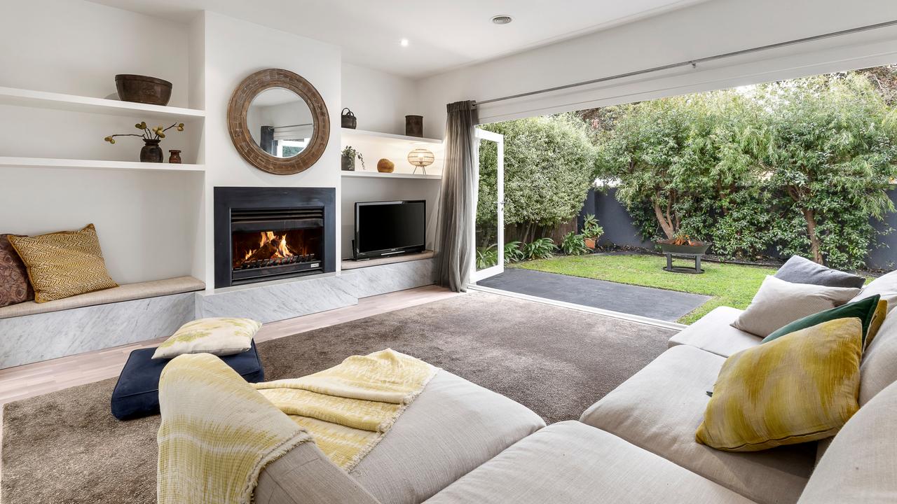 The lounge room opens out to the back yard.