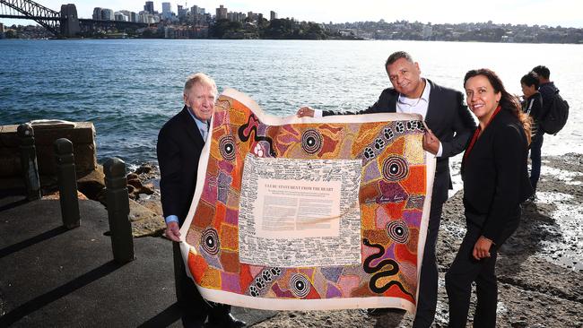 DECENCY: Michael Kirby, Recognise chairman Sean Gordon and Rachel Perkins with the Uluru Statement from the Heart. Picture: JOHN FEDER