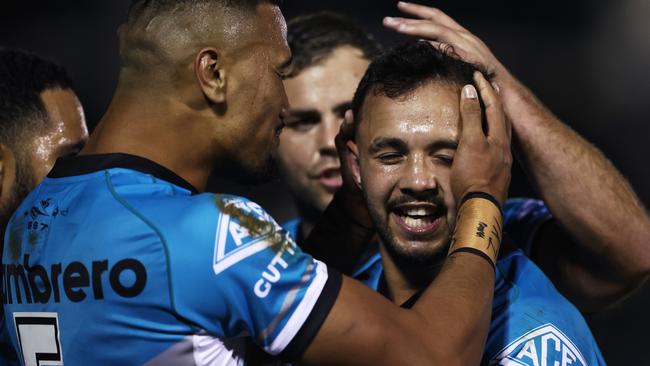 Braydon Trindall celebrates a try during Cronulla’s tough win over the Dragons. Picture: Matt King/Getty