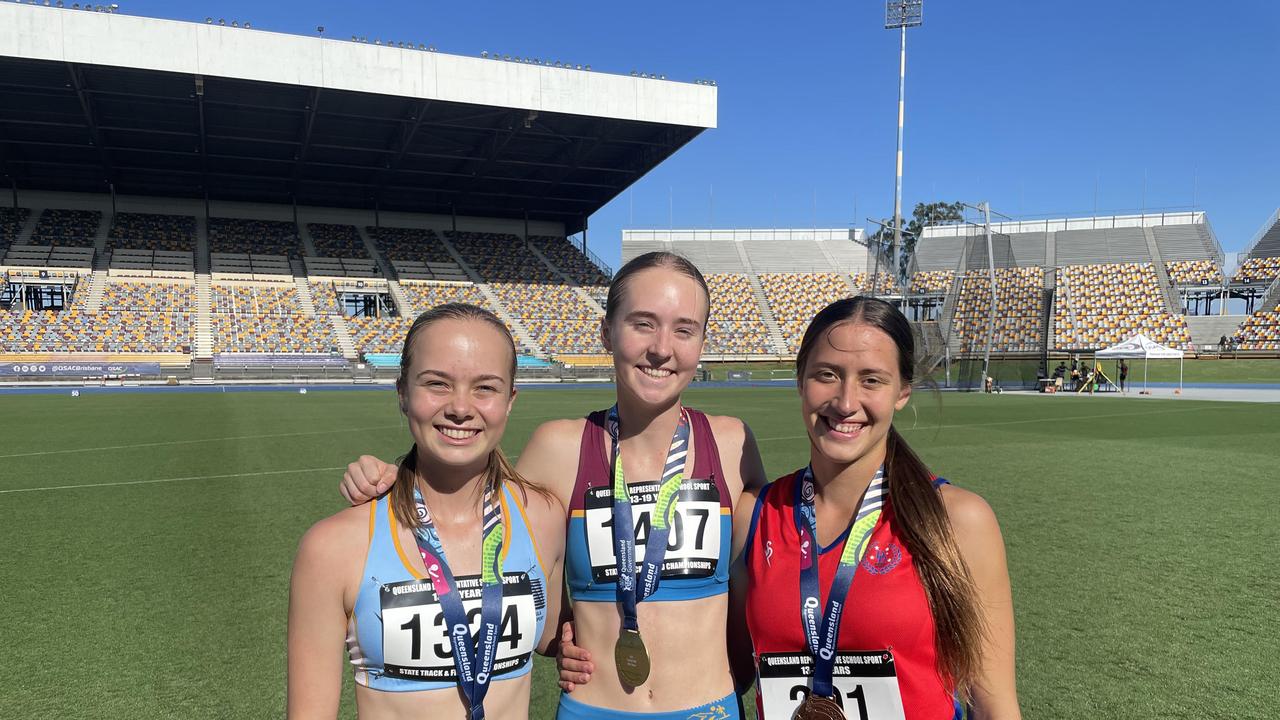 1500m podium finishers Kyah Anderson (middle) with Bridie Maher and Kiera Macdonald.