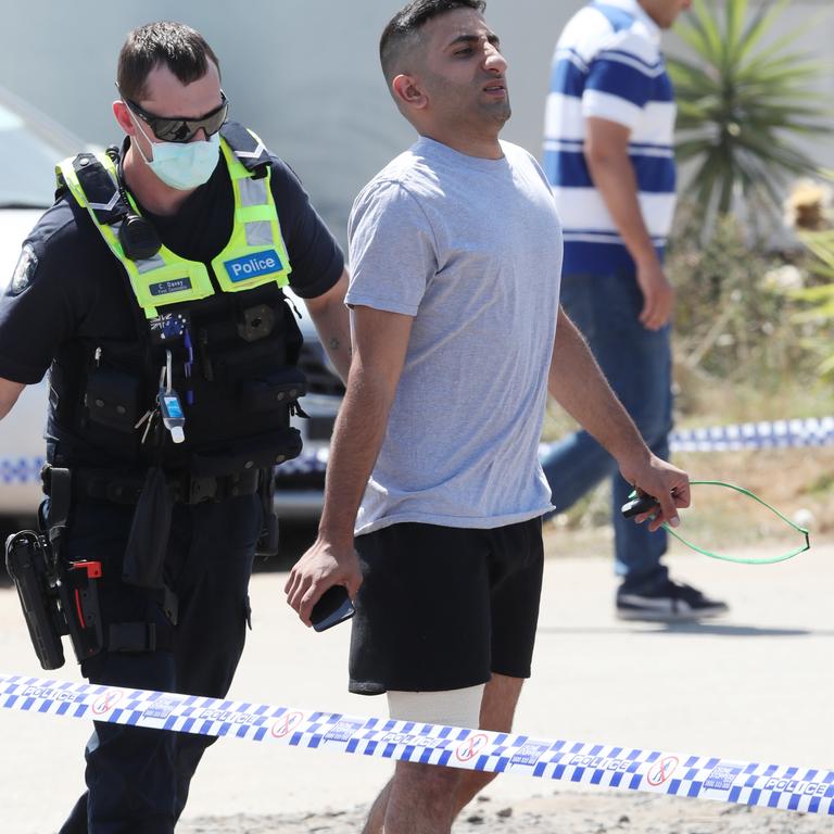 An injured victim who was shot in the leg returned to collect his car on Sunday afternoon. Picture: David Crosling