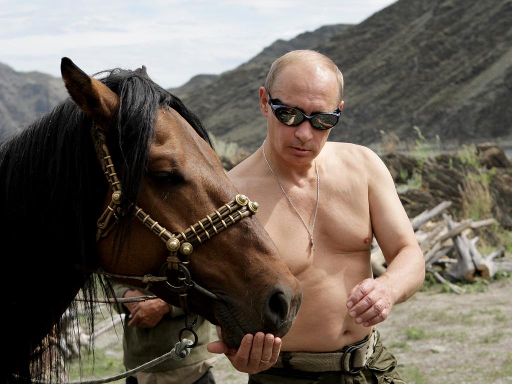 Putin’s pecks have become a talking point at the G7 meeting of world leaders. Picture: AFP