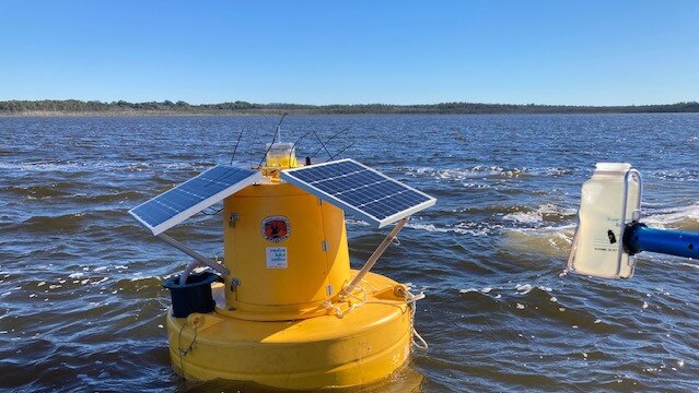 Revive Lake Cathie water testing sensor. Pics Daniel Mills