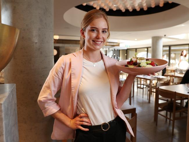 Bar manager Lauren Smith, with Calile Hotel's traditional Greek salad, New Farm. Picture: Liam Kidston.