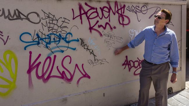 Church St Traders Association president Keiran Cromie surveys graffiti vandalism in Brighton. Picture: Valeriu Campan