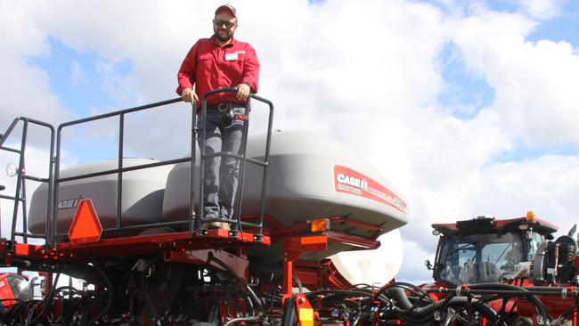 CNH Industrial Product Specialist Andrew Kissel with the Early Riser Front Planter. Mr Kissel said interest has been strong for the massive machine. Photo: Alison Paterson