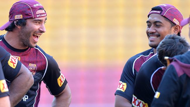 Johnathan Thurston and Anthony Milford share a joke at Origin training.