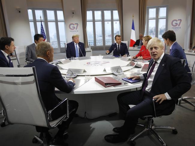 French President Emmanuel Macron, US President Donald Trump, Japan's Prime Minister Shinzo Abe, Britain's Prime Minister Boris Johnson, German Chancellor Angela Merkel, Canada's Prime Minister Justin Trudeau, Italy's Prime Minister Giuseppe Conte, and European Council President Donald Tusk at a G7 working session on "International Economy and Trade, and International Security Agenda". Picture: AP