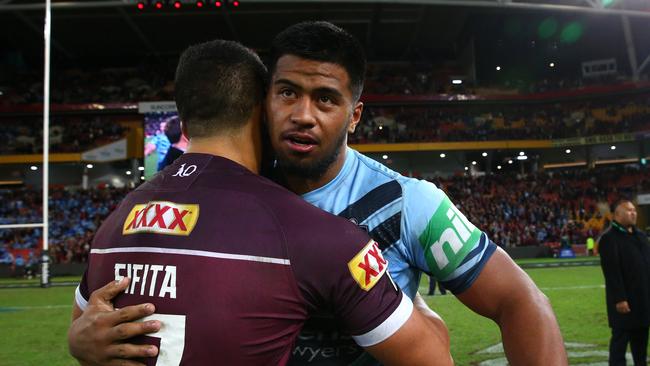 Broncos teammates David Fifita and Payne Haas hug it out after the match. Picture: Adam Head