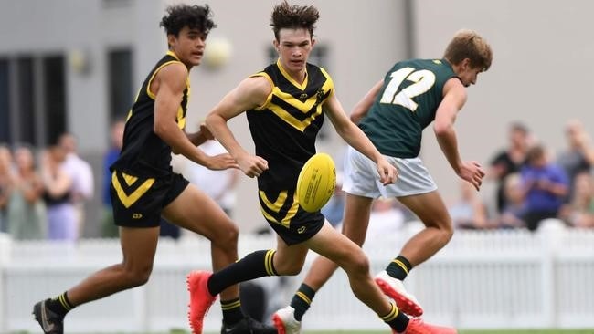 Harri Armstrong playing First XVIII footy at school last year for St Laurence's.