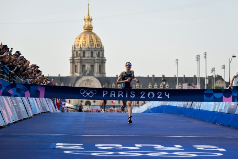 France win women’s triathlon and home hero Marchand targets more golds