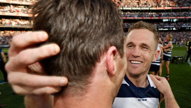 Joel Selwood smiles at Patrick Dangerfield after the Grand Final.