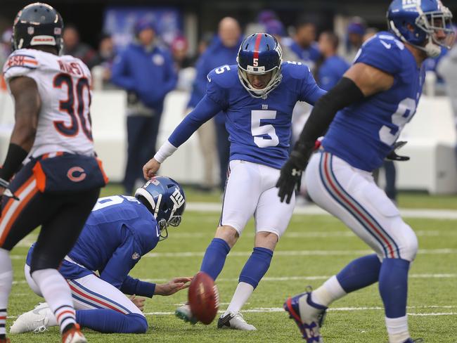 New York Giants kicker Robbie Gould (5) kicks an extra point against the Chicago Bears during the third quarter of an NFL football game, Sunday, Nov. 20, 2016, in East Rutherford, N.J. (AP Photo/Seth Wenig)