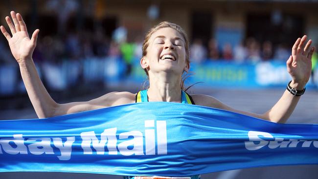 Jess Trengove crosses the line first in the 2010 Sunday Mail City-Bay Fun Run