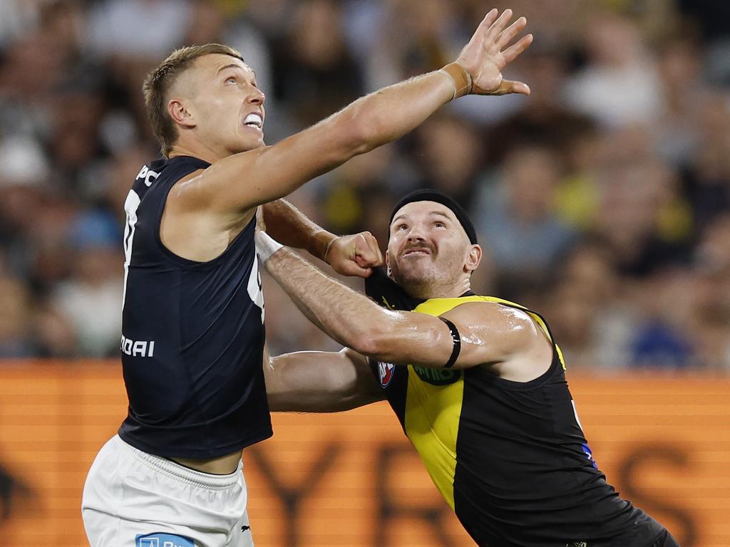 Carlton’s Patrick Cripps (left) and Richmond’s Kamdyn McIntosh engage for a boundary throw-in during the third quarter of the Tigers’ round 1 win over the Blues. Picture: Michael Klein