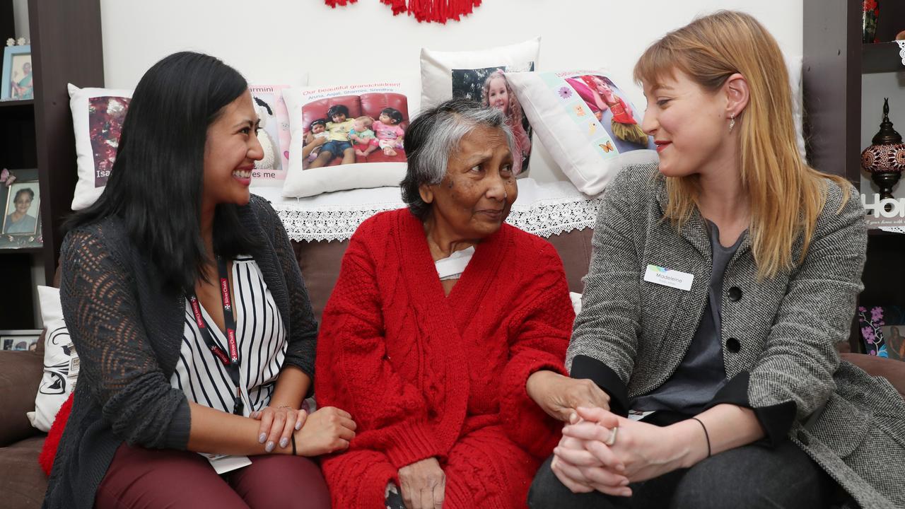 <s1>Lalita Close at home with Western Health staff Antoinette Tanaarte and Madeleine Mittas. </s1>Picture: David Crosling