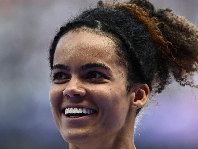 Australia's Torrie Lewis reacts after competing in the women's 200m repechage round of the athletics event at the Paris 2024 Olympic Games at Stade de France in Saint-Denis, north of Paris, on August 5, 2024. (Photo by Jewel SAMAD / AFP)