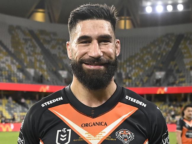 TOWNSVILLE, AUSTRALIA - JULY 24:  James Tamou of the Tigers poses with the match ball after playing 300 games during the round 19 NRL match between the North Queensland Cowboys and the Wests Tigers at Qld Country Bank Stadium, on July 24, 2022, in Townsville, Australia. (Photo by Ian Hitchcock/Getty Images)