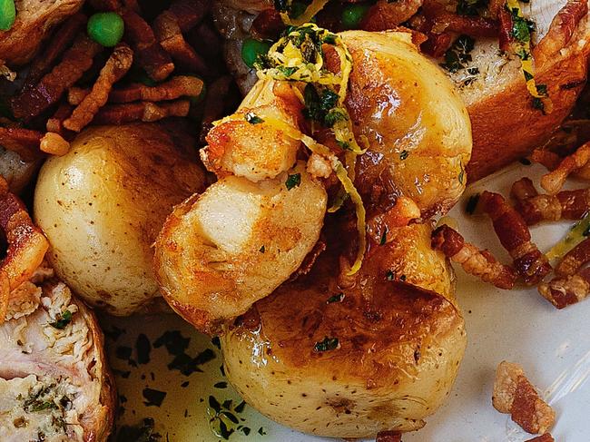 Smashed roast potatoes with garlic and lemon.