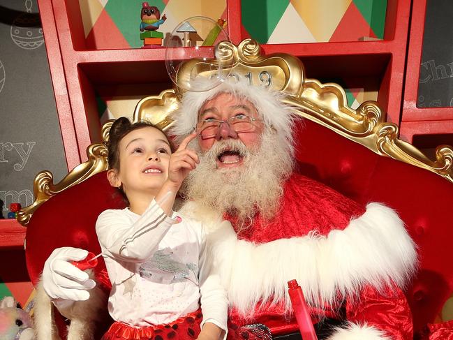 Santa with Layla at Chirnside Park Shopping Centre on Wednesday, November 6, 2019, in Chirnside Park, Victoria, Australia. Picture: Hamish Blair