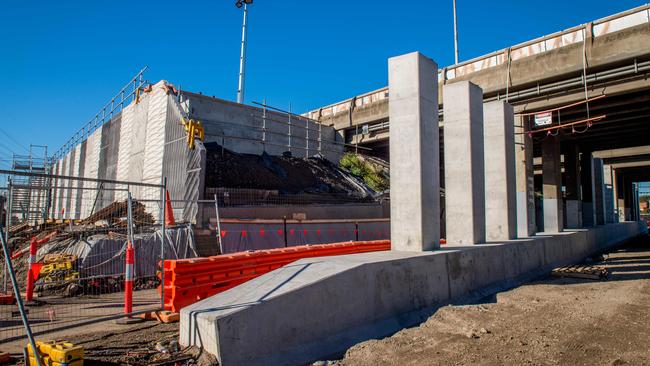 An MCG’s worth of rock and dirt will be dug up at the site over the next three years. Works at the Miller's Rd entrance to the West Gate Freeway. Picture: Jake Nowakowski