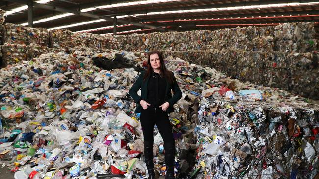 Melbourne property company manager Carly Whitington in a warehouse full of SKM recycling. Picture: Aaron Francis/The Australian