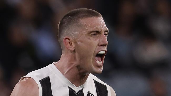 MELBOURNE, AUSTRALIA - AUGUST 23: Darcy Cameron of the Magpies celebrates a goal during the round 24 AFL match between Melbourne Demons and Collingwood Magpies at Melbourne Cricket Ground, on August 23, 2024, in Melbourne, Australia. (Photo by Darrian Traynor/Getty Images)